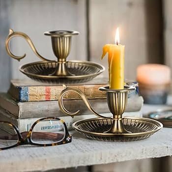 Vintage brass candleholders with beeswax candle